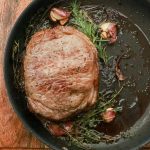 Frying pan with cooking pork